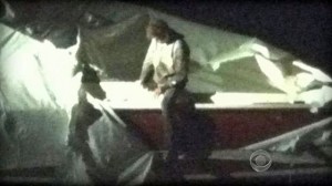 Dzokhar emerges from underneath boat cover during his arrest, apparently uninjured