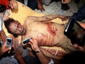 Gaddafi's corpse. Click to enlarge