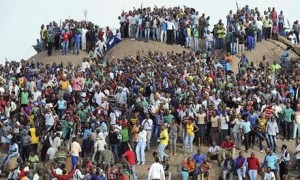 People-gather-for-a-memorial-service-for-the-44-miners-killed-at-Marikana-mine