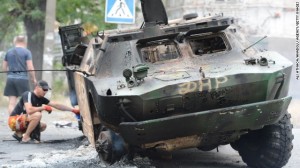 Military vehicle destroyed during clash between pro Russian separatists and Ukrtainian government forces near Mariupol on June 13. Click to enlarge