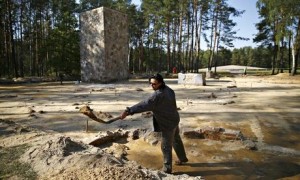 Archeologist Anna Zalewska works among the brick walls thought to be the ruins of gas chambers at the Sobibor camp. Photograph: Kacper Pempel/Reuters. Click to enlarge