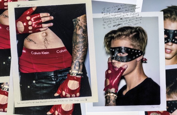 This Justin Bieber photoshoot for Interview magazine could be described as “edgy” but it mostly confirms the status of Bieber as a male Beta Slave. In this pic, Bieber looks like some kind of boy-toy wearing a S&M-style mask. The hand written quote above his head is about Michael Jackson – who also happens to be artist who became a slave to the industry at a very young age.