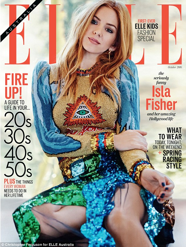 Actress Isla Fisher is on the cover of Elle Australia with a rather visible Illuminati symbol right on her chest. That is kind of like branding cattle with a hot iron … but with a Gucci Dress. Click to enlarge