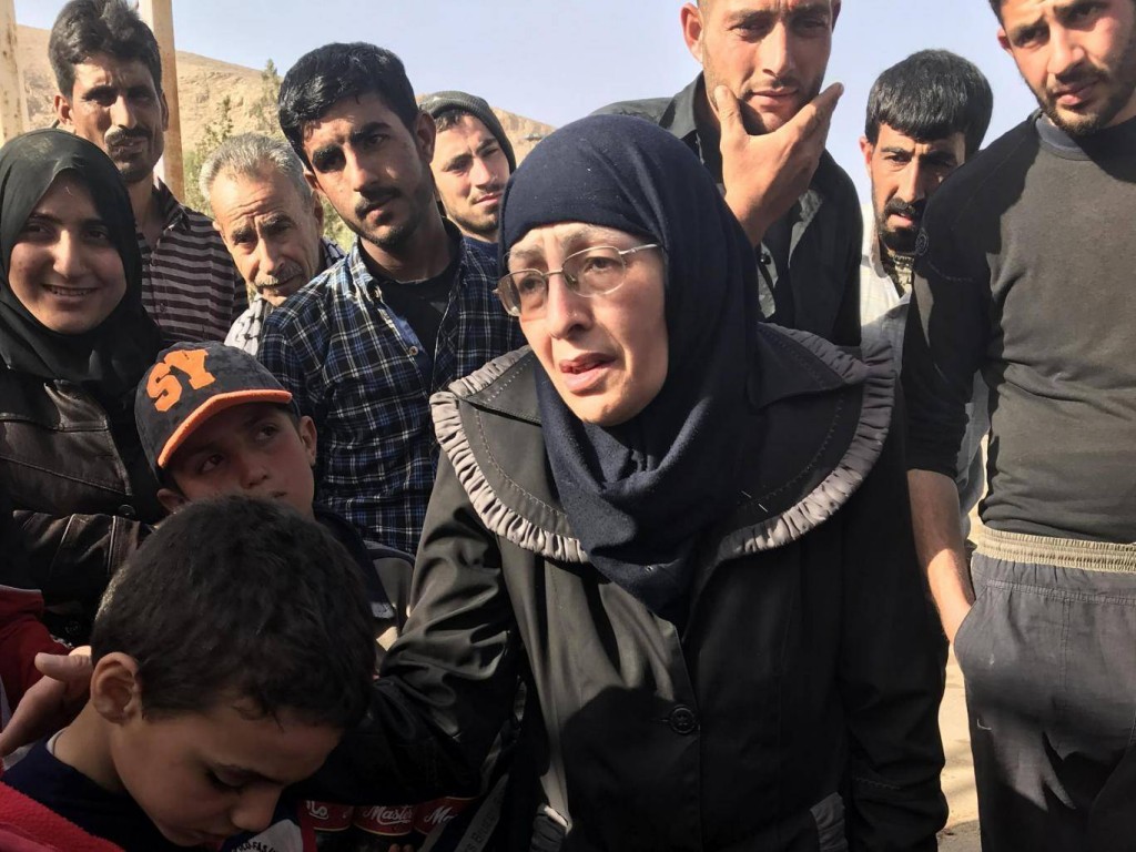 Sana el-Boukeri in Syrian refugee camp. Click to enlarge