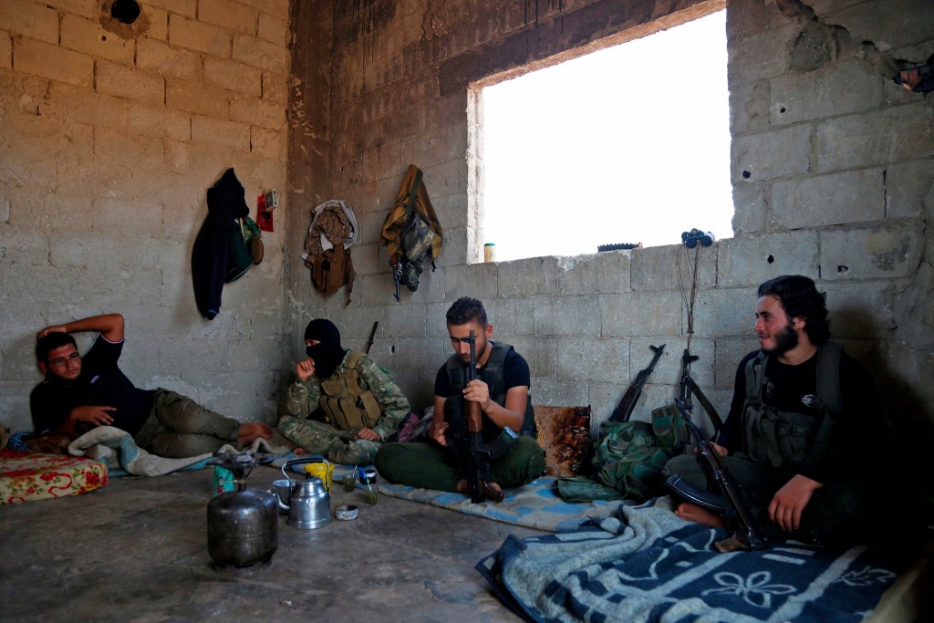 What the NYT describes as "Syrian rebel fighters" preparing last week in anticipation of an attack by government forces on Idlib. Click to enlarge