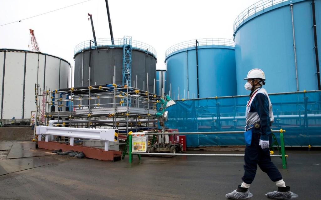Storage tanks for contaninated water at the site of the tsunami wreaked Fukushima plant. Click to enlarge