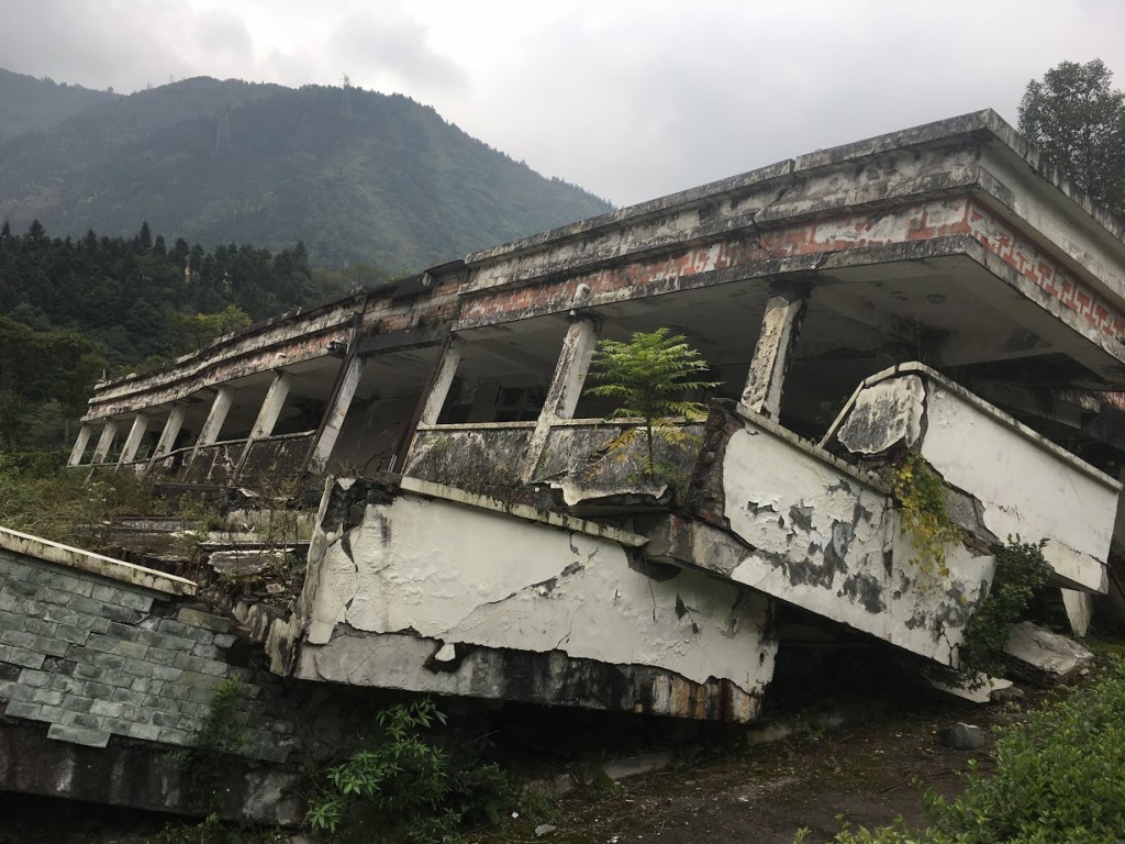 Wreckage from the 8.0 earthquauake. This is not unrepaired devastation but, weirdly, is kept as a tourist attraction and actually propped up so it won’t collapse further. Click to enlarge