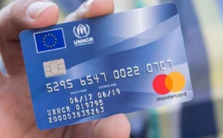 Migrant Mastercard. Click to enlarge