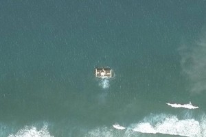 What looks like a radar dome on Bombay Reef, on a newly reclaimed island in the South China Sea. Click to enlarge