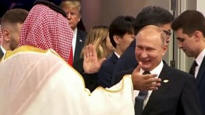 Putin greets Saudi Crown Prince Mohammed bin Salman in Beunos Aires recently. Click to enlarge  