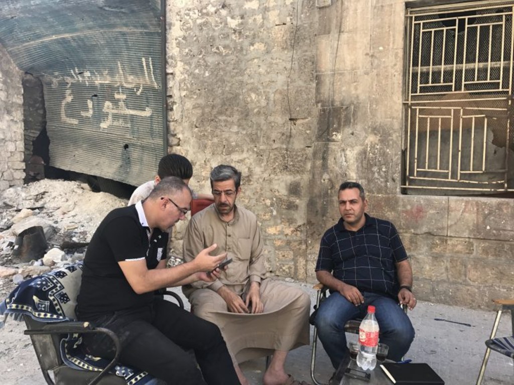 Discussing the November 2016 events in Jib Al Qubbeh with residents Salaheddin Azazi and Ammar Al Bakr, July 2017 © Vanessa Beeley. Click to enlarge