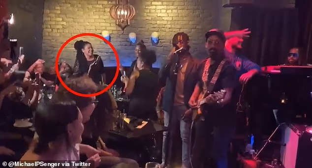 She claimed to have a drink at her table, where she was dancing, and therefore, following health protocols. She also said she was 'feeling the spirit' and 'wasn't thinking about a mask'. Click to enlarge