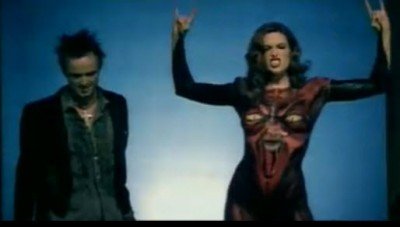 Prostitute flashes the infamous satanic salute