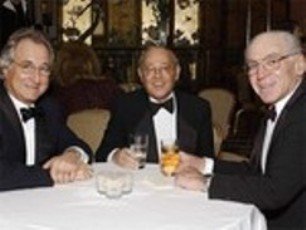 Bernard Madoff (left) treasurer and chairman of the board of Sy Syms School of Business at Yeshiva University with his vice chairman Sy Syms (center) and Josh S. Weston.