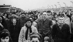 The inmates of a Polish concentration camp: shortly after the camp was overun by advancing Soviet forces and the captives were released. Note the absence of any emaciated figures here