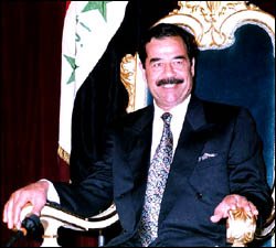 A photo of Saddam while he was still in power, note the dental work.